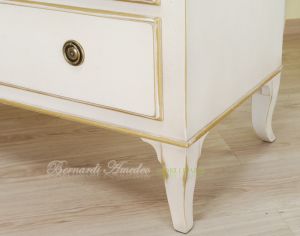 Classic wooden chest of drawers with lacquered finish